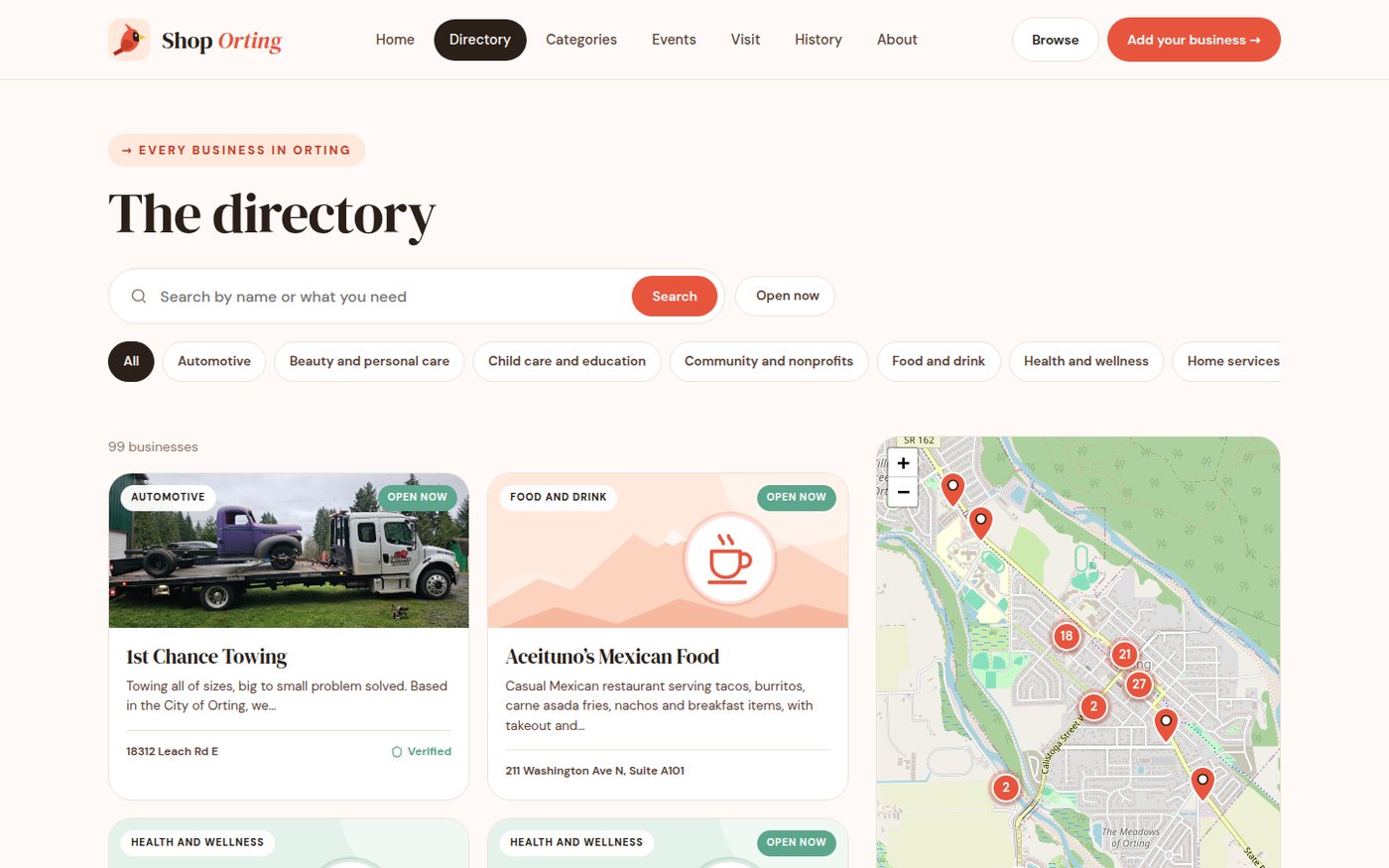 The directory page: search box, category chips, business cards and a map with clustered pins